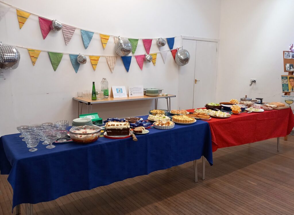 Long table set out with a buffet